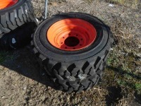 (2) Used Titan 10-16.5 Tires and Wheels