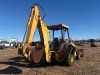 1999 John Deere 310E 4WD Loader Backhoe, s/n 880267: 4-post Canopy, GP Loader w/ Forks, 7009 hrs - 6