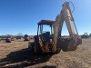 1999 John Deere 310E 4WD Loader Backhoe, s/n 880267: 4-post Canopy, GP Loader w/ Forks, 7009 hrs - 7