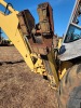 New Holland 555E 4WD Extendahoe, s/n 031001904: 9070 hrs - 9