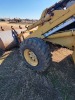 New Holland 555E 4WD Extendahoe, s/n 031001904: 9070 hrs - 25