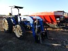 New Holland TN75 MFWD Tractor, s/n 055512: 2-post Canopy, Loader w/ Pallet Forks, 3406 hrs - 2