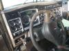 2012 Kenworth T800 Truck Tractor, s/n 1XKDP4EX1CJ303172: Tri-axle, Day Cab, Factory Heavy Haul, Cummins 500hp Eng., 18-sp., 20K Front, 46K Rears, Air Ride Susp., Encl. Headache Storage, Light Bar, Odometer Shows 500K mi. - 18
