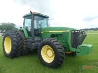 John Deere 8400 MFWD Tractor, s/n RW8400P011755: Encl. Cab, Front Counterweights, 20.8R42 Rear Duals, 16.9-30 Fronts, Lift Arms, 4 Hyd Remotes, Drawbar, Meter Shows 8590 hrs