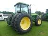 John Deere 8400 MFWD Tractor, s/n RW8400P011755: Encl. Cab, Front Counterweights, 20.8R42 Rear Duals, 16.9-30 Fronts, Lift Arms, 4 Hyd Remotes, Drawbar, Meter Shows 8590 hrs - 2