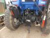 New Holland TS6-110 Tractor, s/n NT01095M: Rollbar, Powershuttle, PTO, Drawbar, 2 Hyd Remotes, Alamo Samurai Hyd. Ditch Bank Mower, Meter Shows 5672 hrs - 3