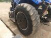 New Holland TS6-110 Tractor, s/n NT01095M: Rollbar, Powershuttle, PTO, Drawbar, 2 Hyd Remotes, Alamo Samurai Hyd. Ditch Bank Mower, Meter Shows 5672 hrs - 5