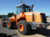 Doosan DL220 Rubber-tired Loader, s/n 10113: Encl. Cab, w/ Bucket & Stacking Rake, Quick Connect Coupler, Meter Shows 4276 hrs - 4