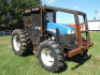 New Holland TS6.120 MFWD Tractor, s/n 2059910: 2 Hyd. Remotes, Wood Boss Enclosure System, Winch, 18.4-34 Rears, Meter Shows 4023 hrs - 2