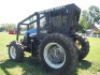 New Holland TS6.120 MFWD Tractor, s/n 2059910: 2 Hyd. Remotes, Wood Boss Enclosure System, Winch, 18.4-34 Rears, Meter Shows 4023 hrs - 5