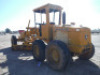 John Deere 570A Motor Grader, s/n 507477: Canopy, 12' Moldboard, Front Scarifier, 13.00-24 Tires - 4