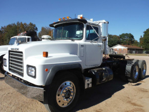 2001 Mack RD690S Truck Tractor, s/n 1M2P264Y21M032773: Mack 300 Eng., 7-sp., 12K Front, 44K Rears, Camelback Susp., 5.55 Ratio, Headache Rack, Former County Truck, Odometer Shows 233K mi.