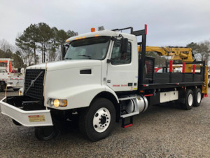 2009 Volvo Material Handler Truck, s/n 4V5KC9EF79N270263 (Selling Offsite): Volvo D31 335hp Eng., 8LL, 20K Front, 40K Rears, Lockers, Builtrite 80 Loader Grapple, Mag & Gen Set, RR Wheels will be removed if no RR Buyer, Located in Summerville, GA