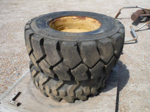 Pallet of (2) 8-lug Rims & 12-16.5 Foam-filled Tires