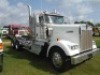 2016 Kenworth W900 Truck Tractor, s/n 1XKWD40XXGJ128399 (Title Delay): Ext Cab, Cummins 475 Eng., Deleted, Jake Brake, 10-sp., 46K Rears, KW 8-bag Air Glide Susp., Odometer Shows 470K mi. - 2