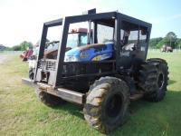 New Holland TS6030 MFWD Tractor, s/n N50436M: Woods Boss Forestry Pkg., Cable Winch, 2 Hyd Remotes, Meter Shows 1550 hrs