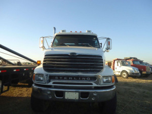 2007 Sterling LT9500 Rolloff Truck, s/n 2FZHAZCV67AY63589: Mercedes Eng., 8LL, 46K Rears, Hendrickson Susp., 2010 RDK 60000 lb. Body, Model U5-0R-174, 2113 actual mi. (County-Owned), ID 43380