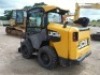 JCB 300 Eco Skid Steer Loader, s/n GE0300WCB1746398: Power Boom, C/A, Heat, Hyd. Coupler, Aux. Hydraulics, Side Door Entry, w/ MTL Extreme 30-ton Rotating Hydraulic Tree Shear, Meter Shows 1047 hrs - 4