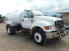 2006 Ford F750 Water Truck, s/n 3FRXF75E06V384424: S/A, Cummins 5.9L Eng., 6-sp., 12K Front, 21K Rear, 2000-gal Tank, Front & Rear Spray Nozzles, Odometer Shows 16K mi. - 2